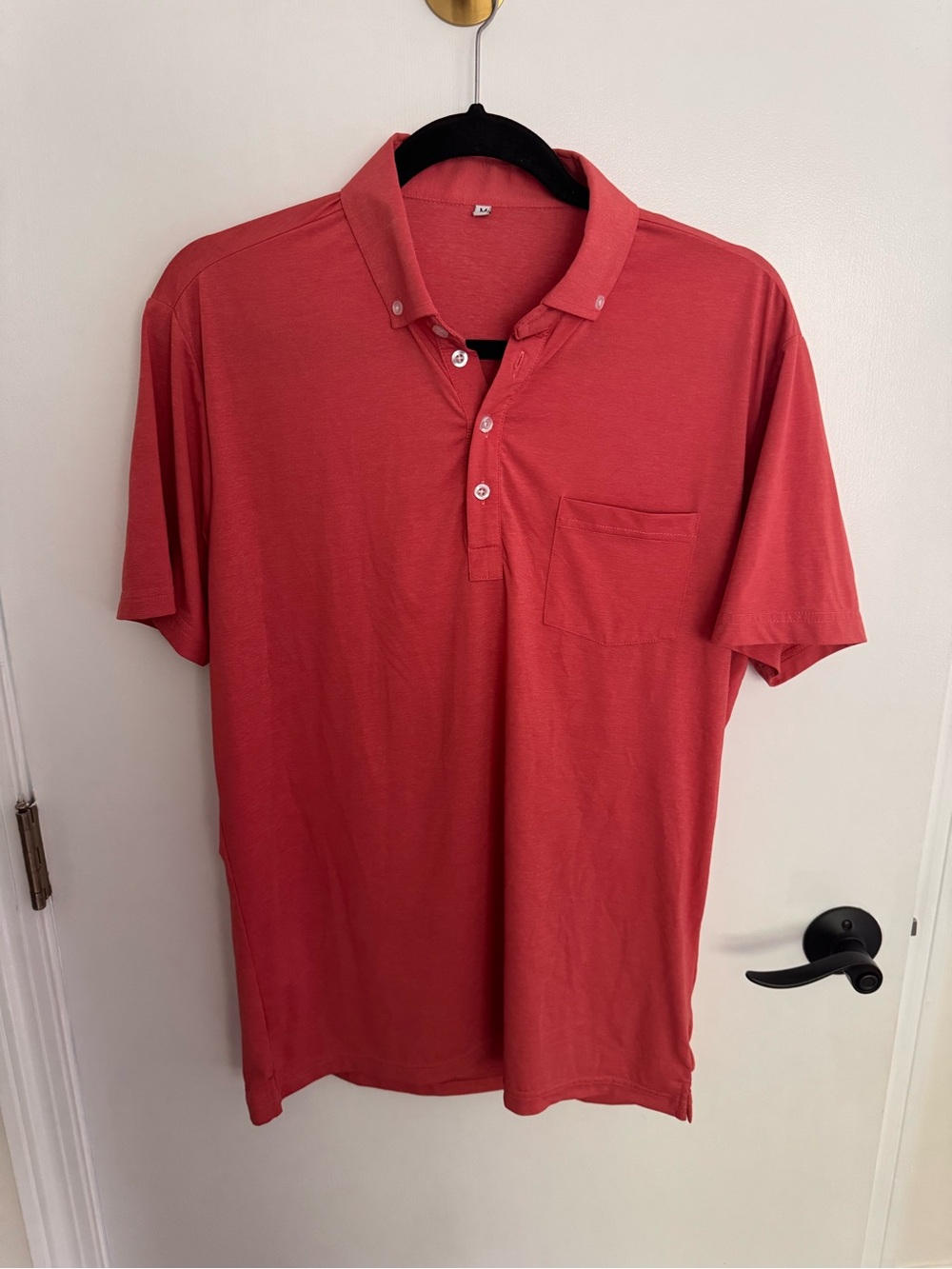 State and Liberty salmon colored men’s polo